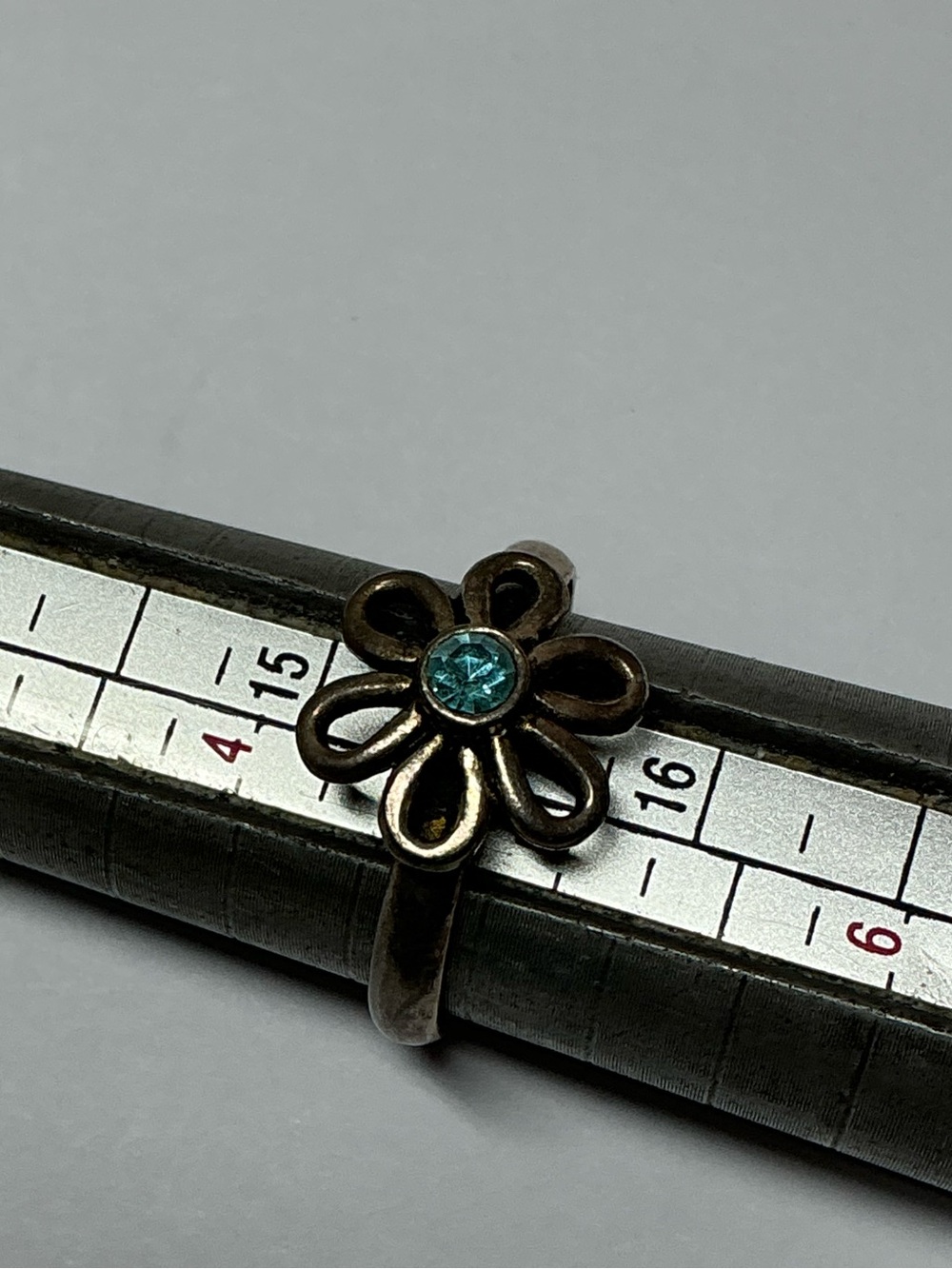 Vintage Sterling Silver Flower Ring with Blue Crystal Accent